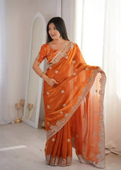 Orange Zari Embroidered Saree portrait looking away smiling
