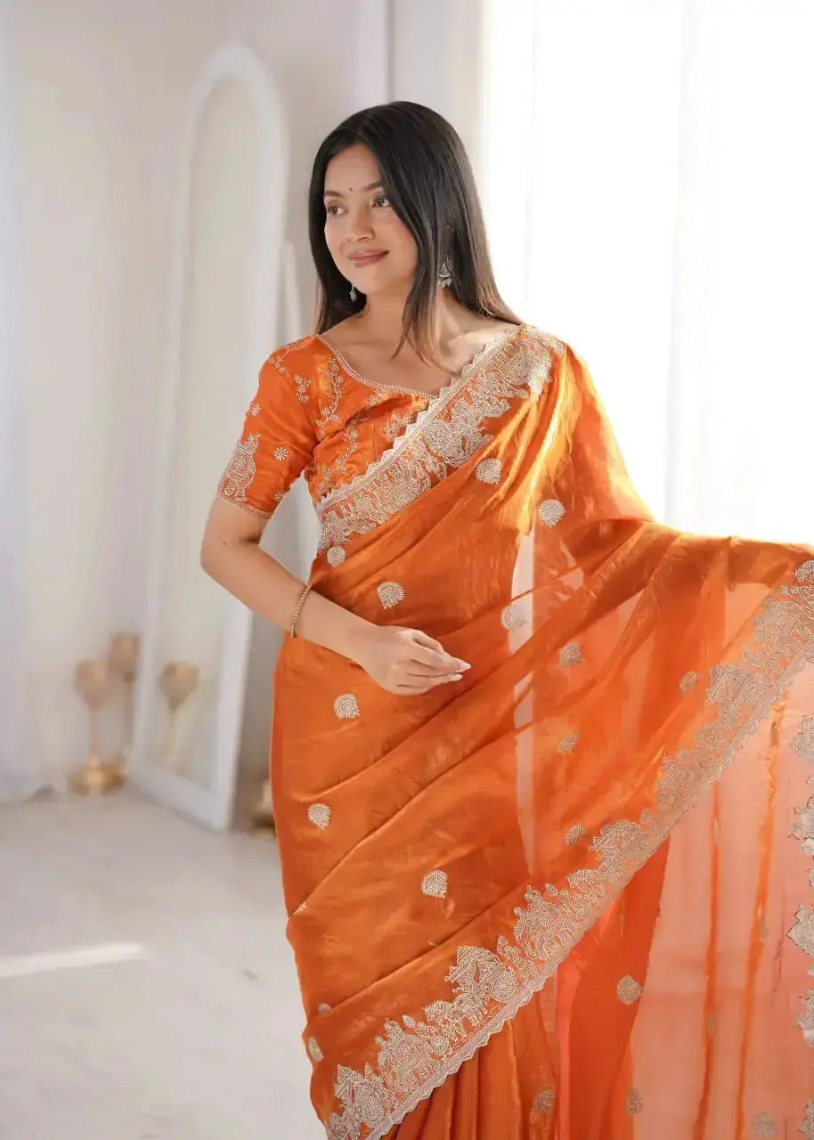 Orange Zari Embroidered Saree close-up portrait looking away