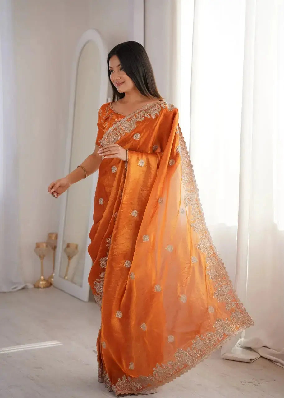 Orange Zari Embroidered Saree side view walking pose