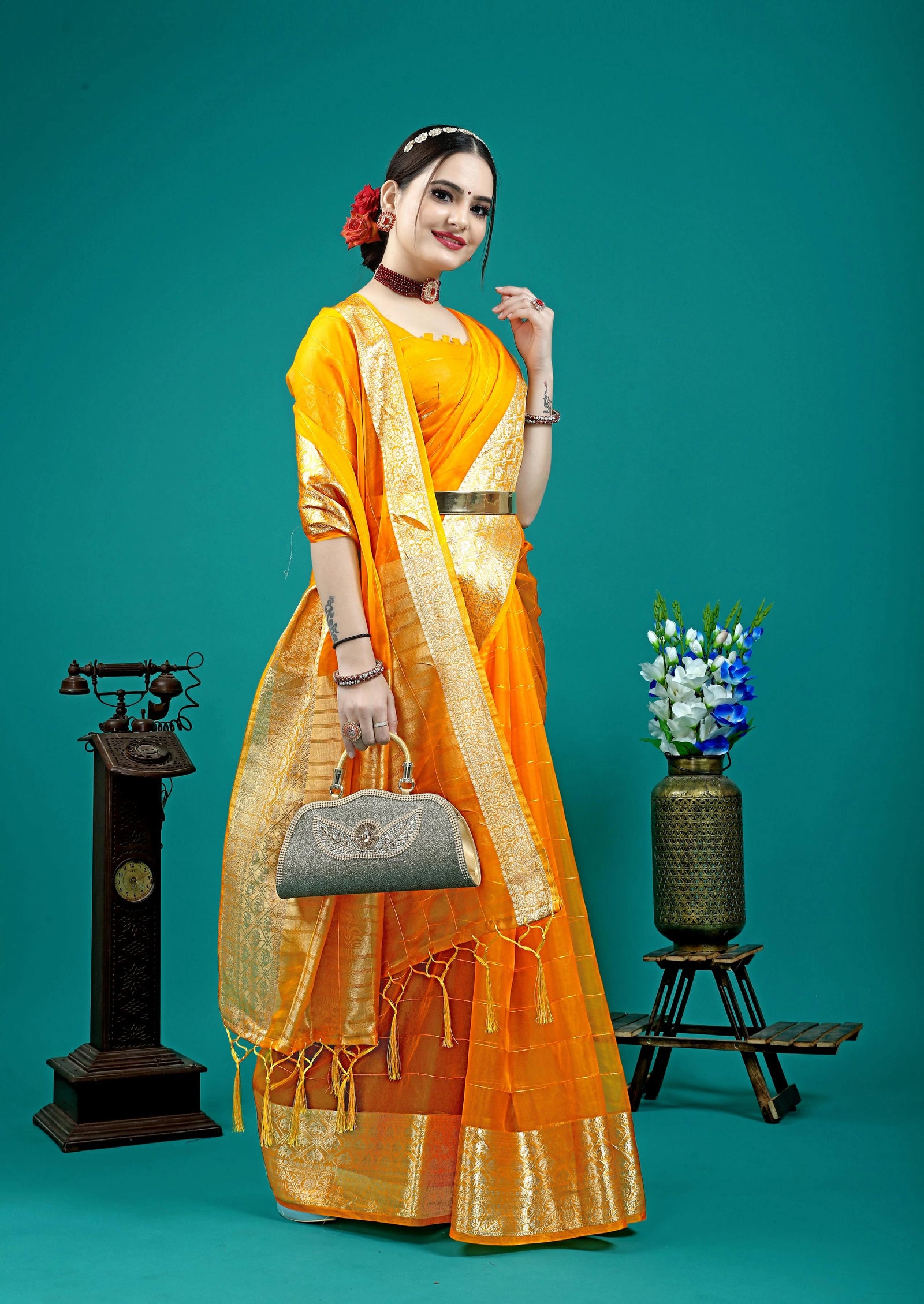 Traditional silk saree featuring rich pallu and tassel detailing.