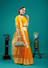 Traditional silk saree featuring rich pallu and tassel detailing.