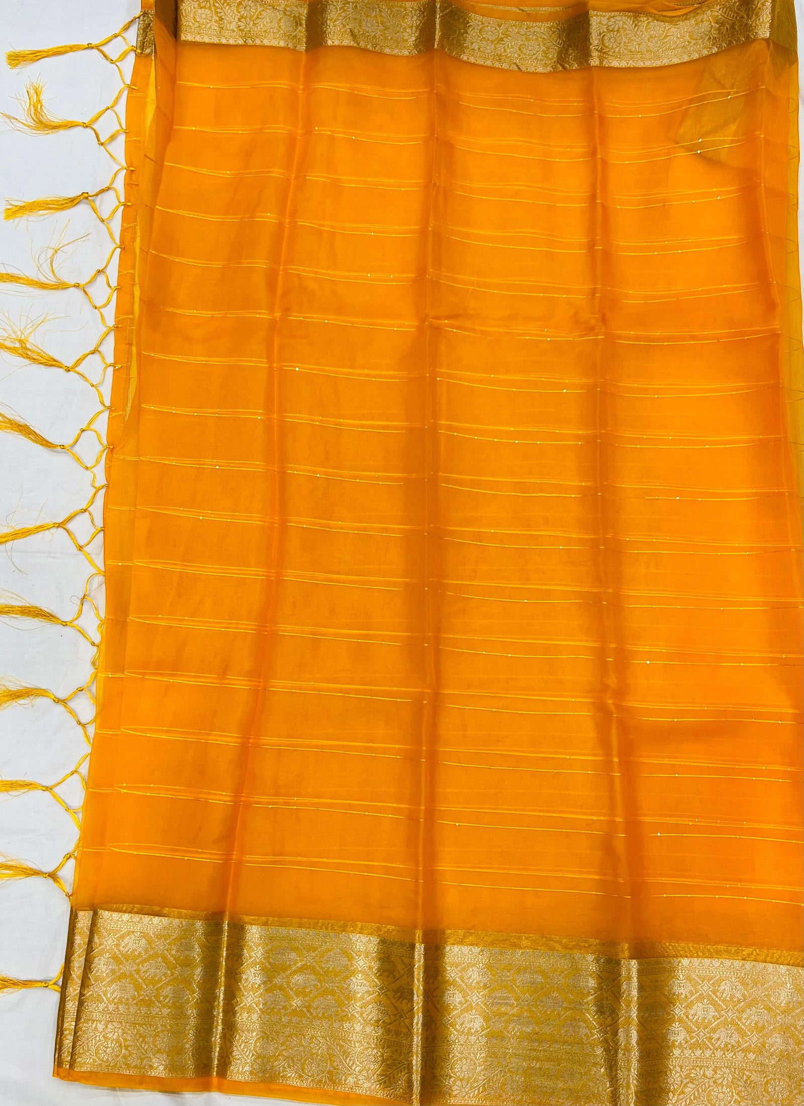 Graceful party wear saree showcasing timeless Banarasi inspired craftsmanship.