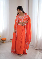 Woman wearing an orange traditional outfit with a white background