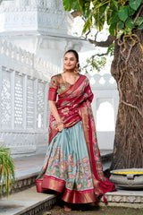 Designer festive lehenga choli with floral embroidery, artistic prints, and rich woven borders for weddings and celebrations.