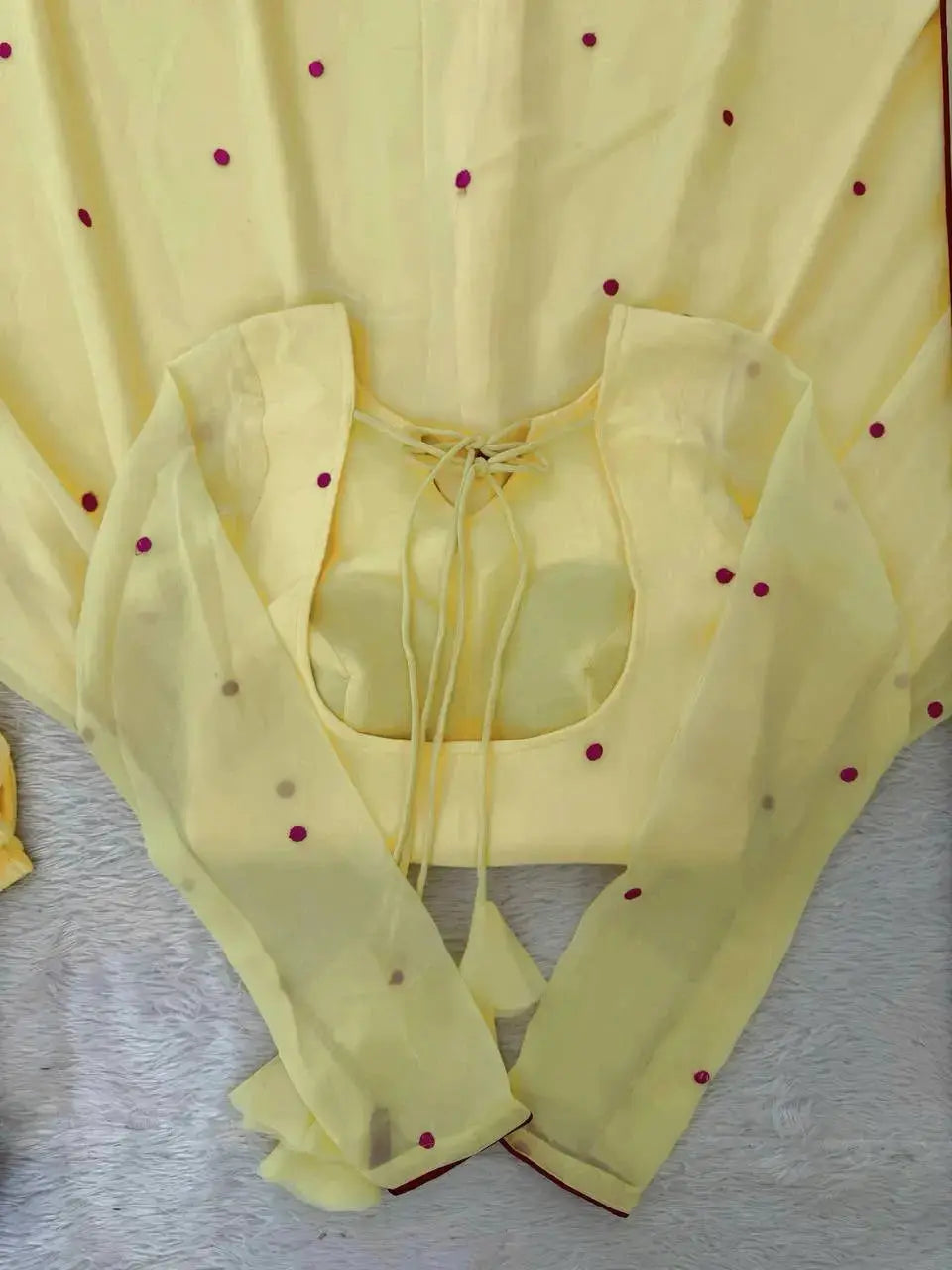 Elegant Pastel Yellow Ethnic Suit Set with Floral Neck Embroidery, Dotted Dupatta, and Graceful Flared Design