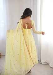 Women's Light Yellow Ethnic Suit Set with Delicate Embroidery, Full Sleeves, and Soft Flowing Silhouette