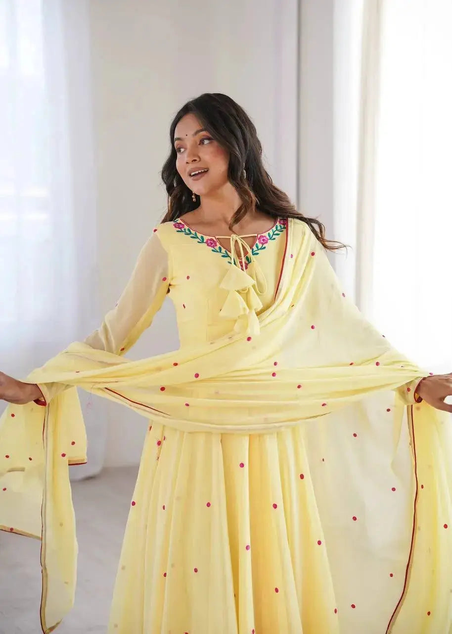 Graceful Yellow Party Wear Anarkali Suit with Floral Neck Embroidery, Dotted Dupatta, and Elegant Ethnic Look