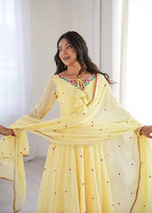 Graceful Yellow Party Wear Anarkali Suit with Floral Neck Embroidery, Dotted Dupatta, and Elegant Ethnic Look