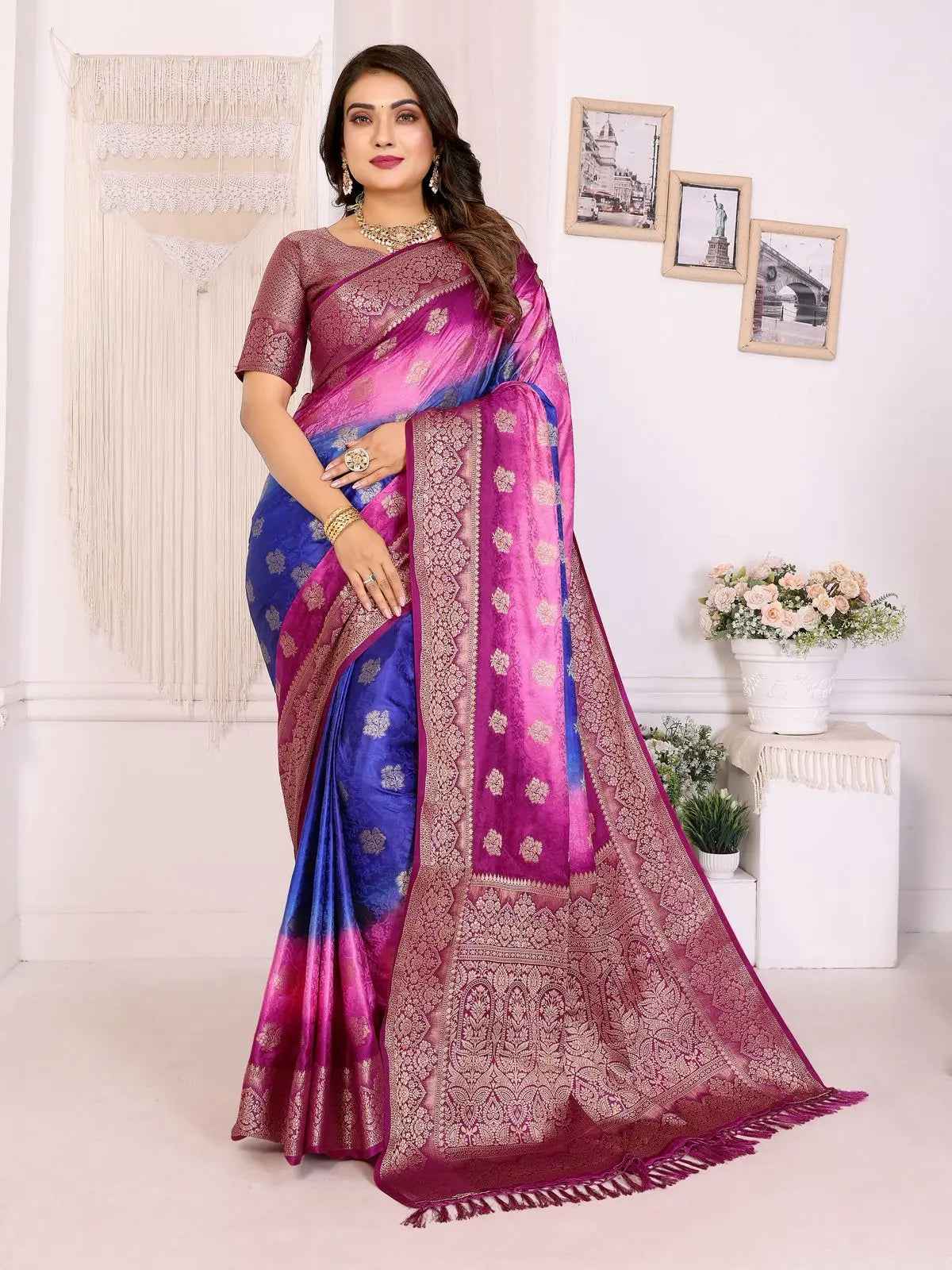 Woman wearing a multicolored saree with a white background