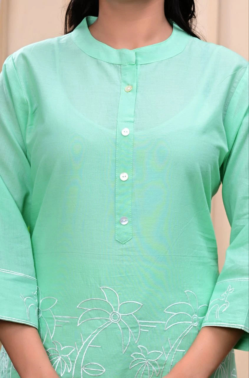 Light green kurta with floral embroidery on a neutral background