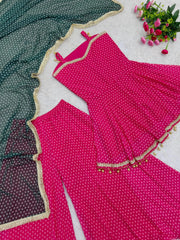 Flat lay of Pink Bandhej Print Suit showing ghungroo hem detail and dupatta