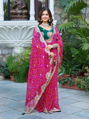 Model wearing Pink Gota Patti Saree with green Mono Silk blouse, front pose