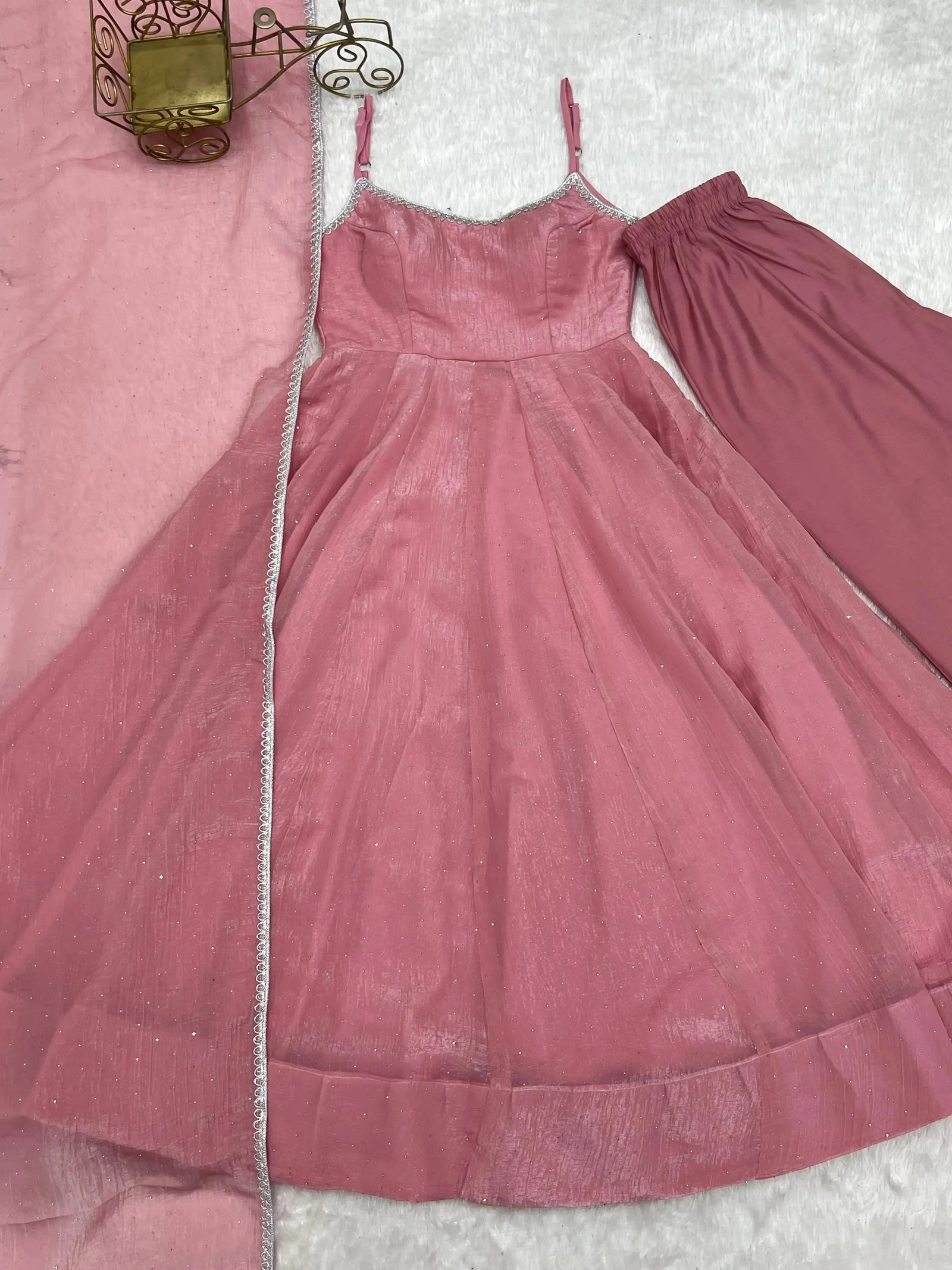 Pink Swarovski suit, pant and dupatta set laid flat