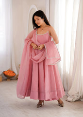 Pink Swarovski suit with lace-trimmed neckline, front view