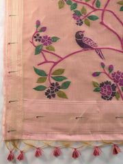 Pink fabric with embroidered bird and floral patterns on a white background