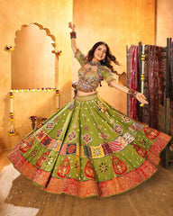 Woman in traditional green and red embroidered outfit dancing in a decorated room.