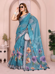 Rama Blue Linen Cotton Saree – action shot with large poppy and pansy floral print and contrast grey border