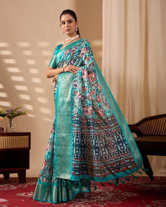 Woman wearing a traditional outfit with a floral design in a room with a beige wall and wooden furniture.