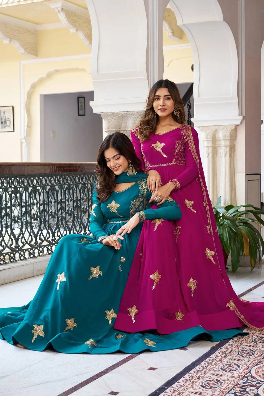 Designer Rama blue faux georgette suit with elegant sequins and embroidery for festive wear