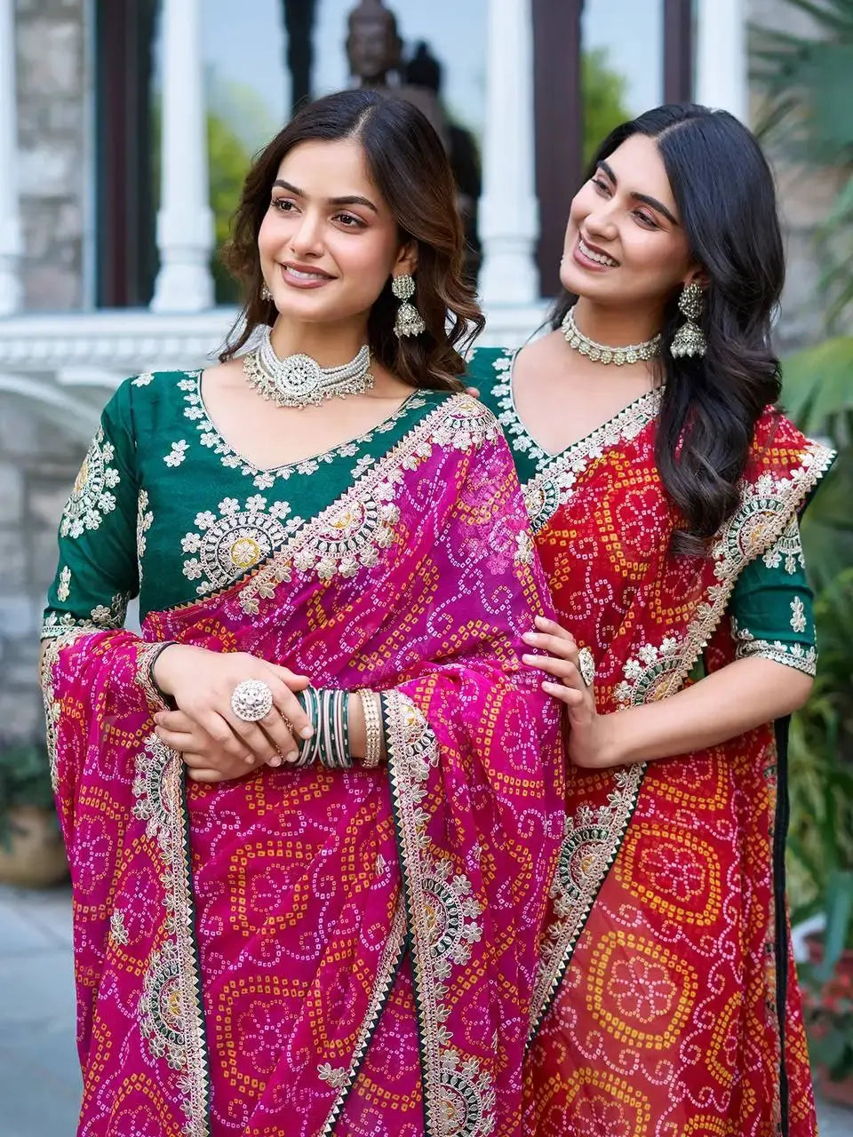 Two models in Pink and Red Gota Patti Sarees, close-up shot