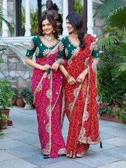 Two models in matching Gota Patti Sarees holding hands