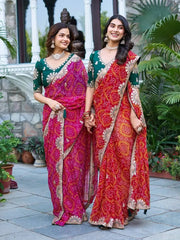 Two models standing close together in Red and Pink Gota Patti Sarees