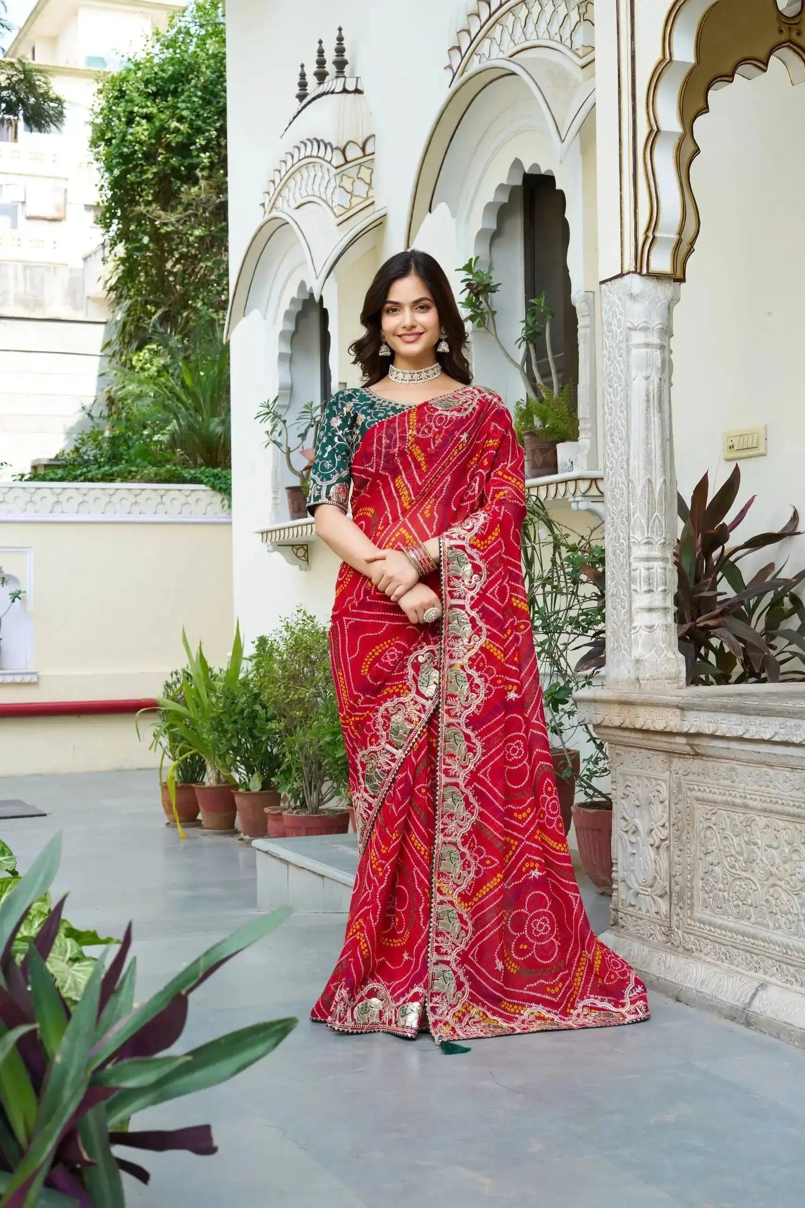 Red Gota Patti Saree full length front view with green blouse and pallu drape
