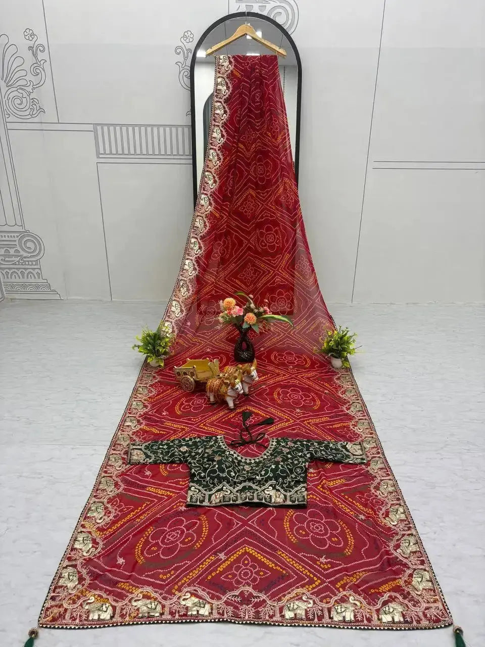Red Gota Patti Saree and blouse flat lay showing full Bandhani print and gota-patti border