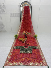Red Gota Patti Saree and blouse flat lay showing full Bandhani print and gota-patti border