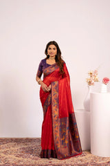 Woman wearing a red saree with a white background