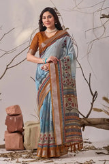 Sky Blue Digital Floral Print Linen Cotton Saree – front drape view with contrast border and golden tassel hem