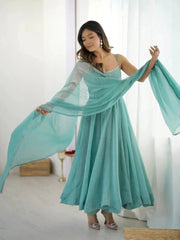 Sky blue Swarovski anarkali suit, side view showing flare