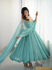 Sky blue Swarovski suit flared skirt in motion, close view