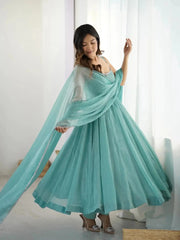 Sky blue Swarovski suit flared skirt in motion, close view