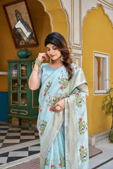 Sky Blue Thread Embroidered Jacquard Saree with crane and lotus motifs, front standing pose