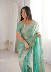 Sky Blue Zari Embroidered Saree pallu held out showing gold zari work