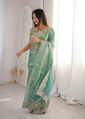 Sky Blue Zari Embroidered Saree side drape walking pose