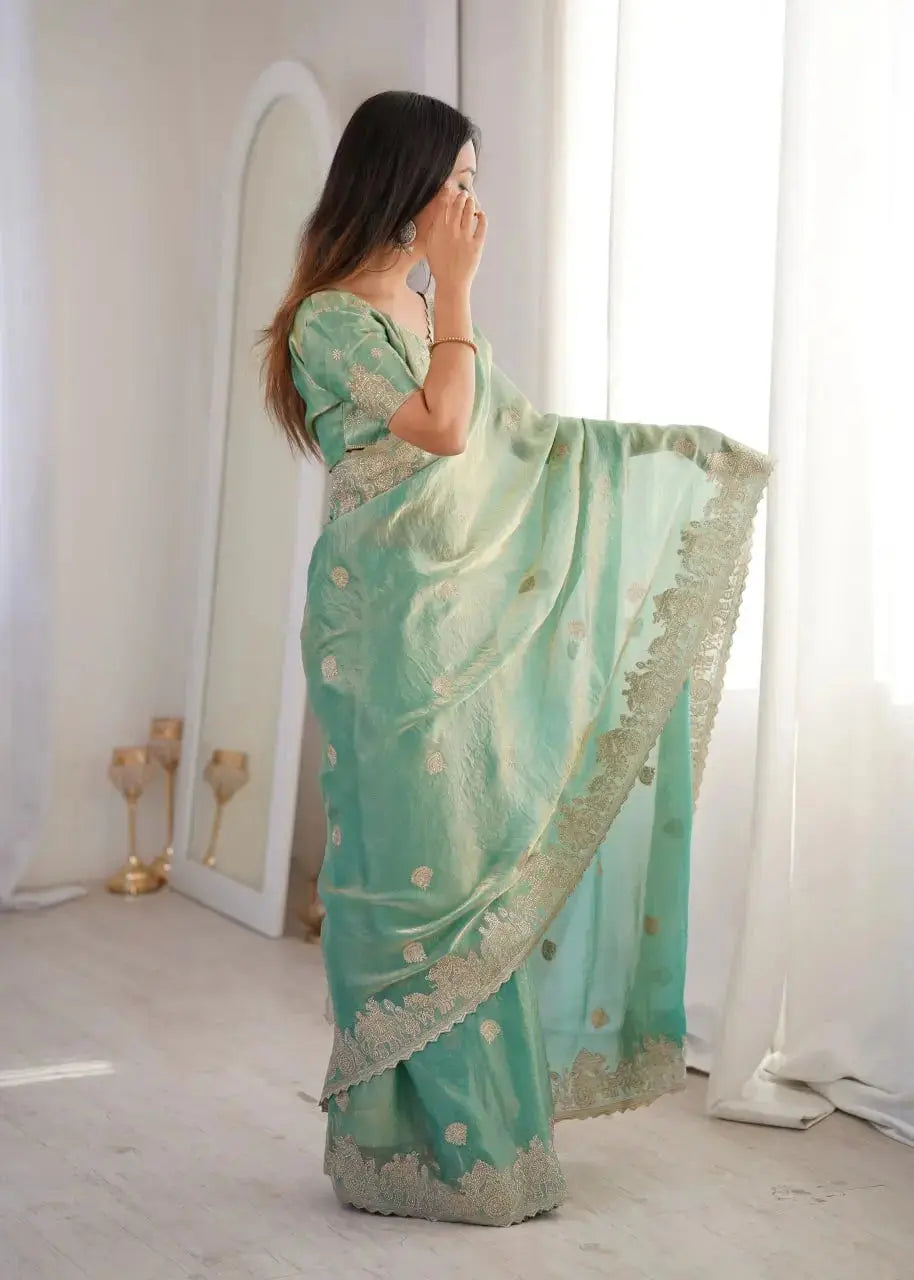 Sky Blue Zari Embroidered Saree side pose with pallu draped over shoulder