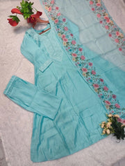 Light blue outfit with floral embroidery on a white background