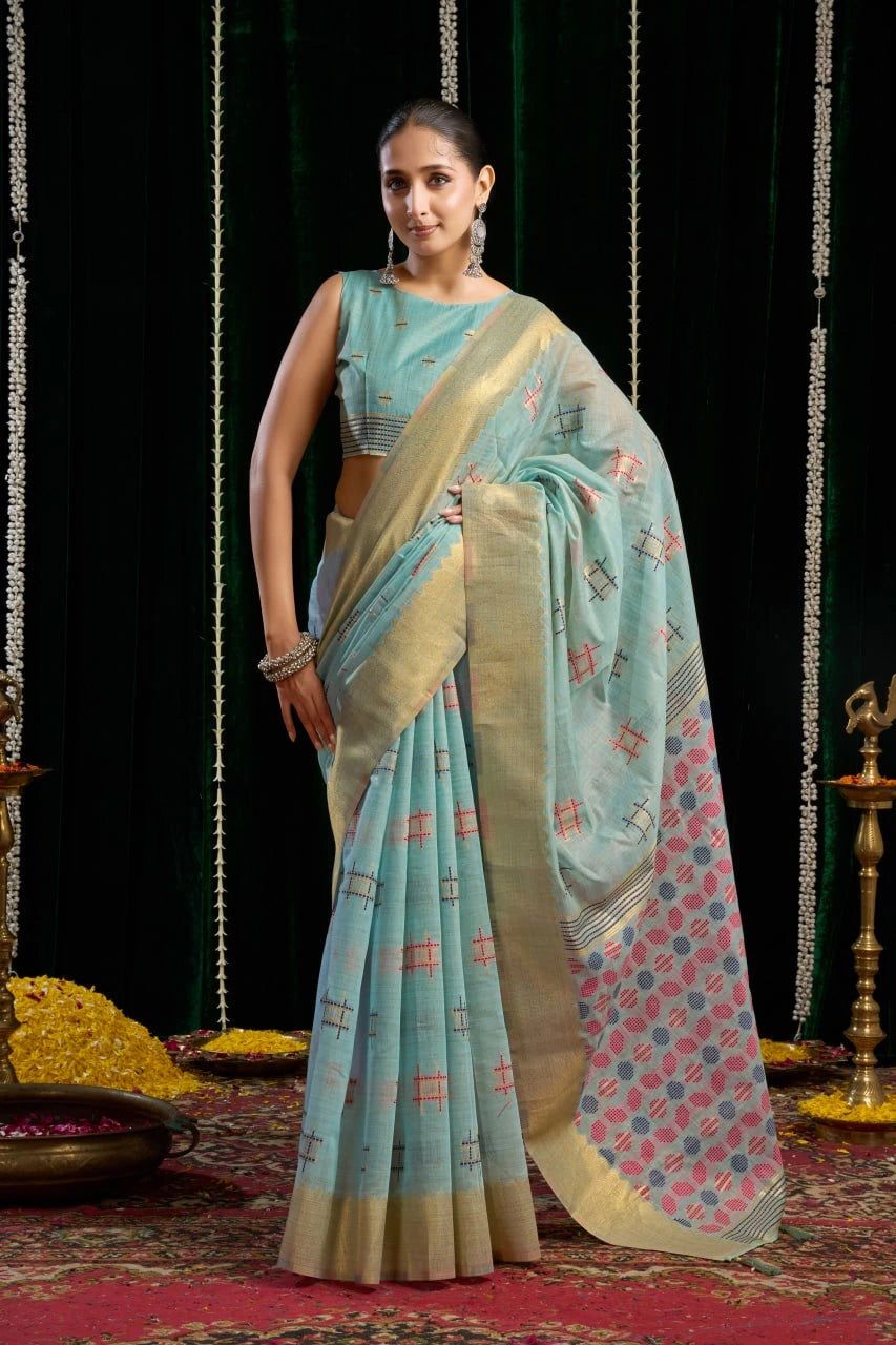 Woman in a traditional saree with a dark background