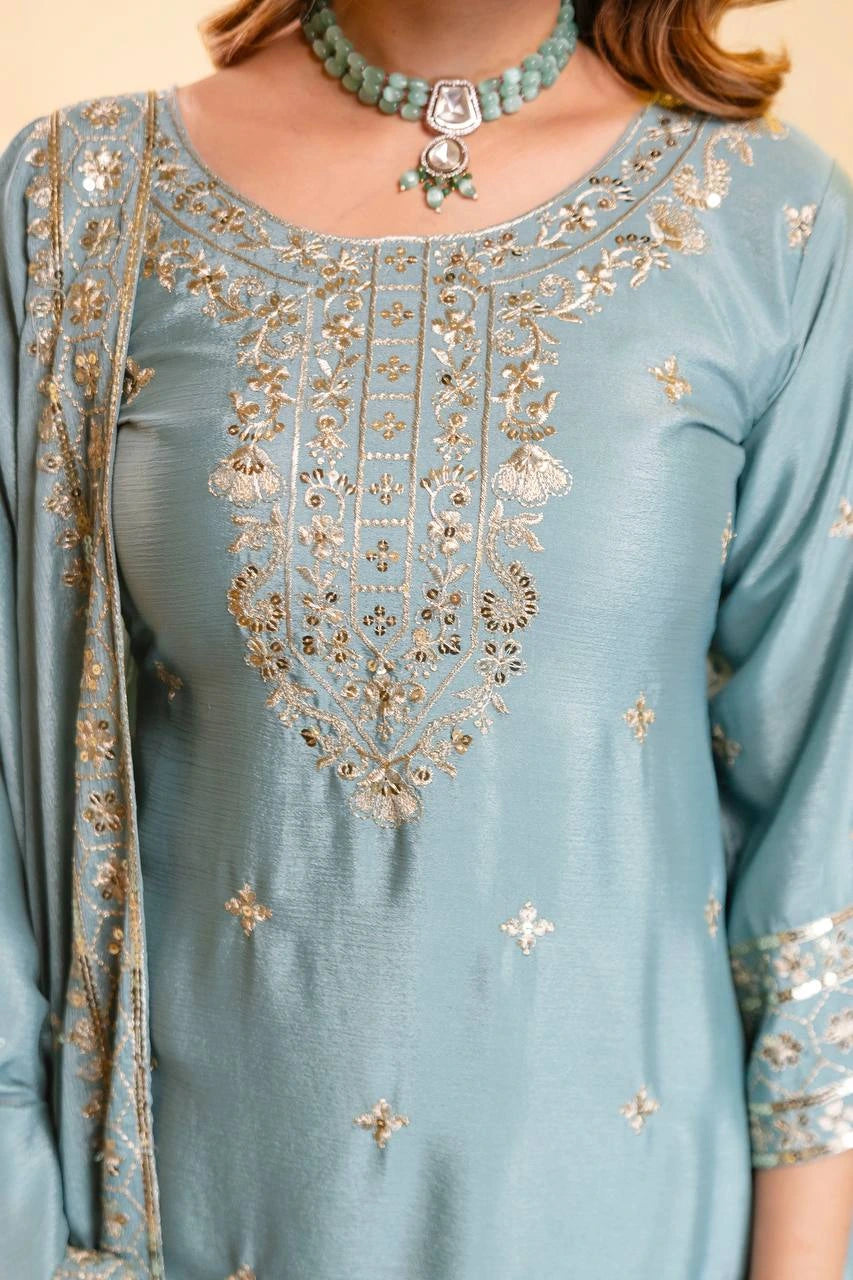 Light blue embroidered dress with gold detailing
