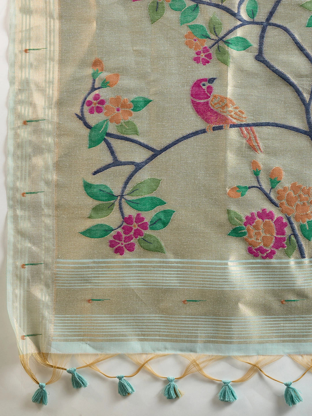 Beige fabric with floral and bird embroidery on a white background