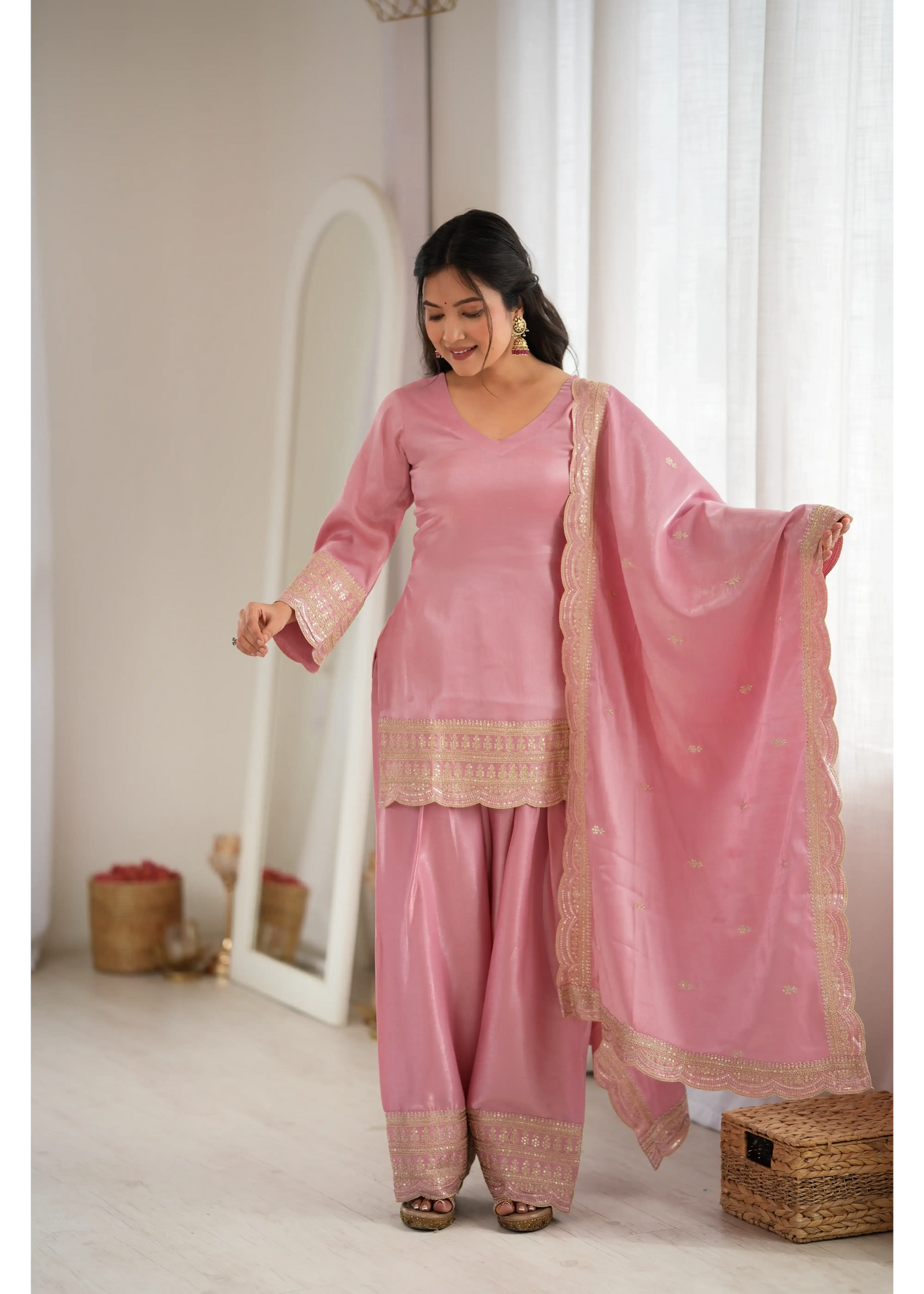 Soft Pink Suit with Scallop Hem and Embroidery – Dupatta Held Up View