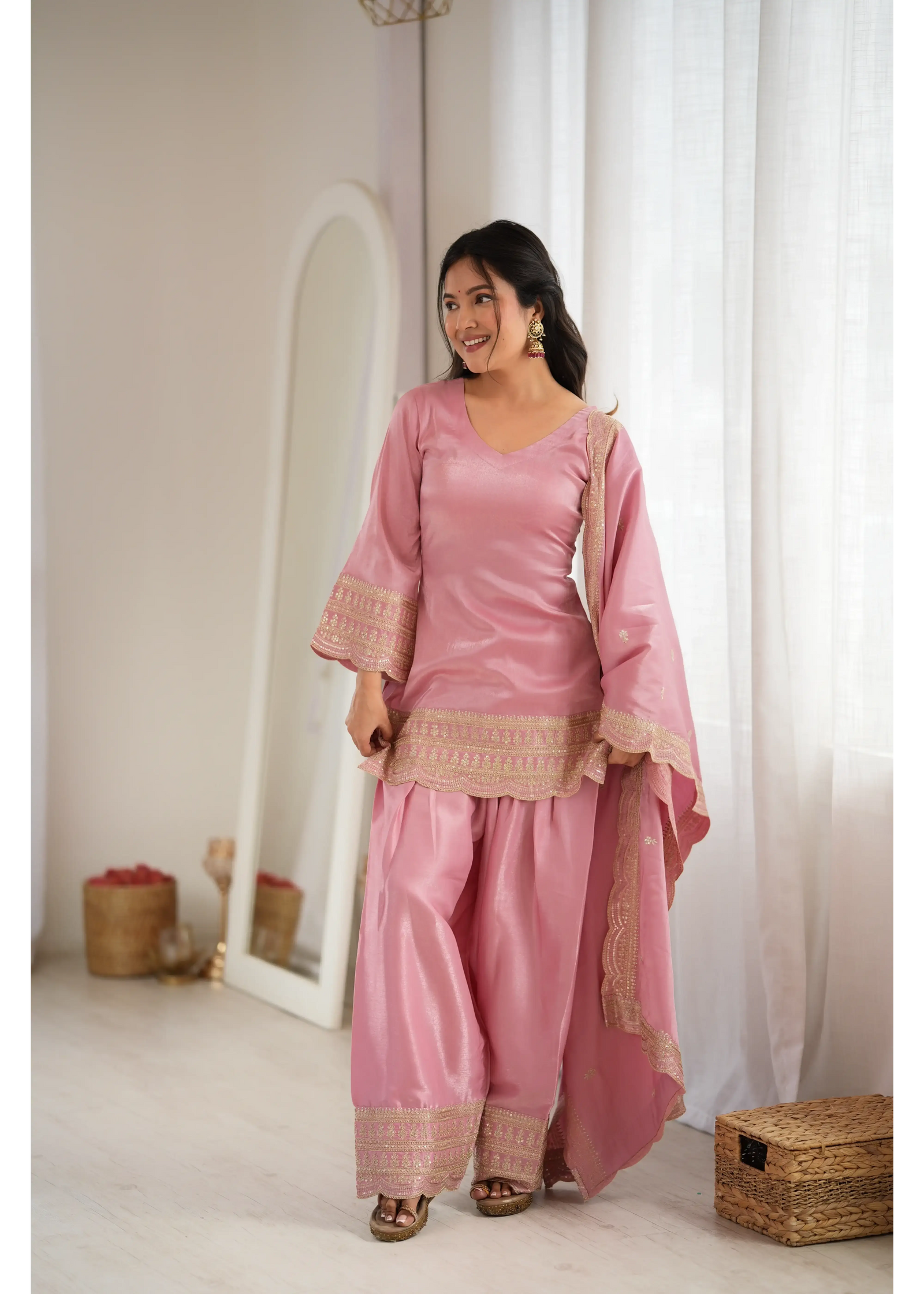 Soft Pink Sequins Zari Work Suit – Side View with Dupatta Flying