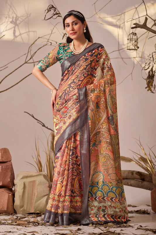 Woman wearing a traditional saree with a patterned design against a neutral background