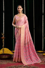 Woman in a pink saree with a black background
