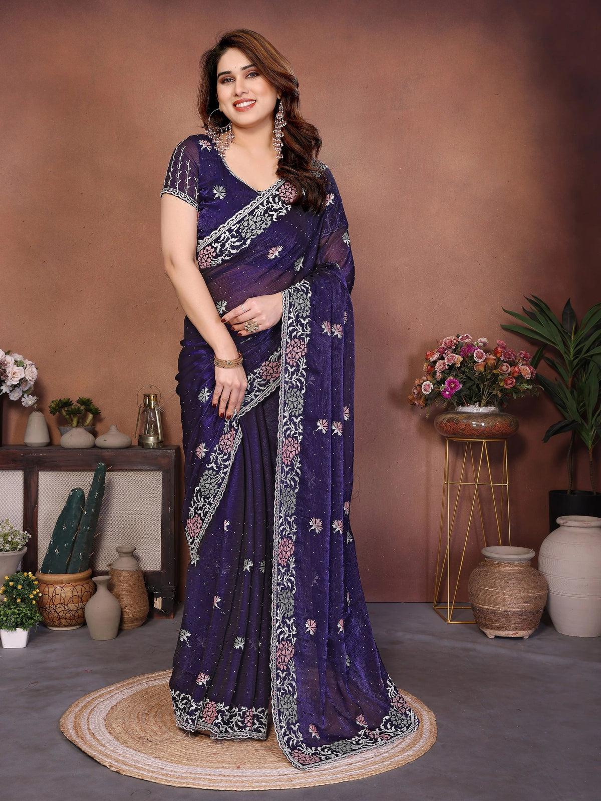Soft purple embroidered Swarovski work chiffon silk saree with delicate Fendy design, shimmering border, and matching blouse piece — elegant attire for festive and wedding occasions