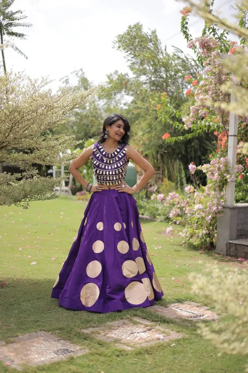 Fashion-forward purple designer lehenga blends classic Indian craftsmanship with modern ethnic elegance.