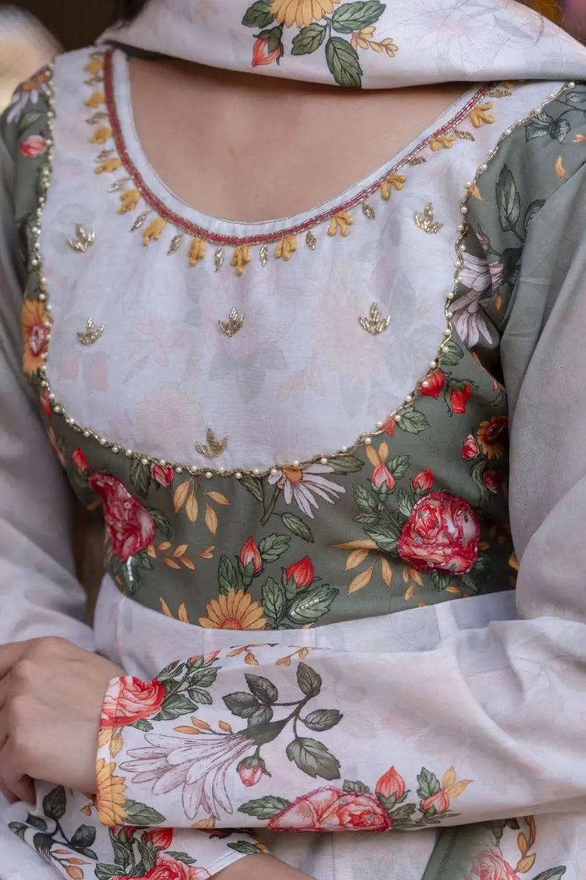 Elegant women's ethnic wear featuring premium fabric, detailed floral artwork, and sophisticated styling.