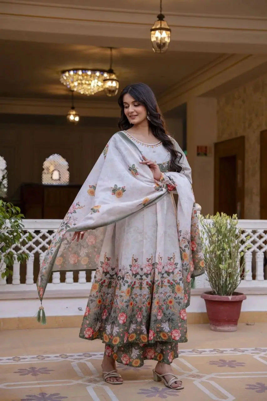 Soft pastel Anarkali suit designed with artistic floral motifs and premium craftsmanship for all-day comfort.